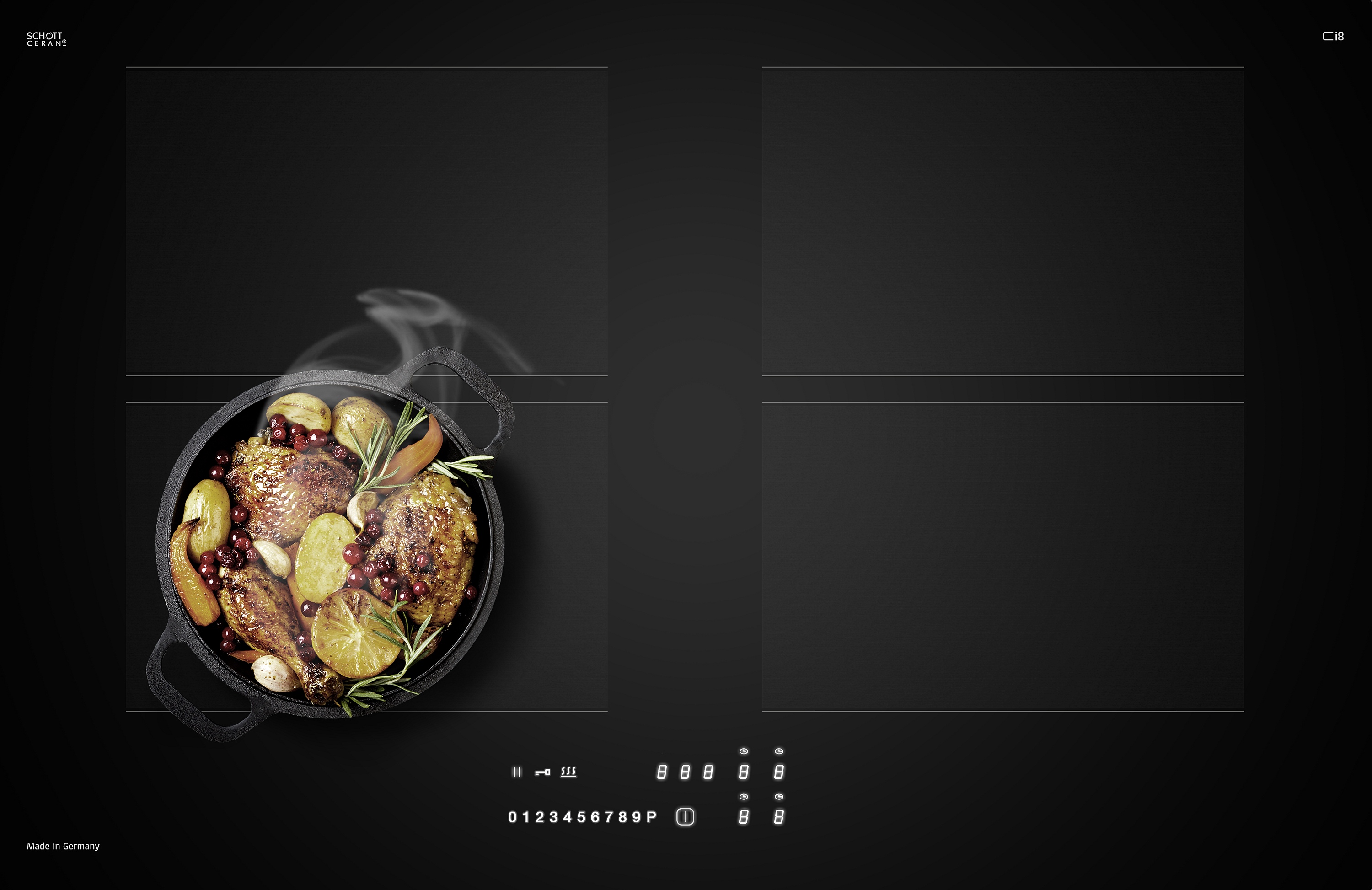 CASO Design Induktionskochfeld mit gusseisernem Bräter darin Hähnchenkeulen Kartoffeln Knoblauch Orangenscheiben Rosmarin Karotten rote Beeren